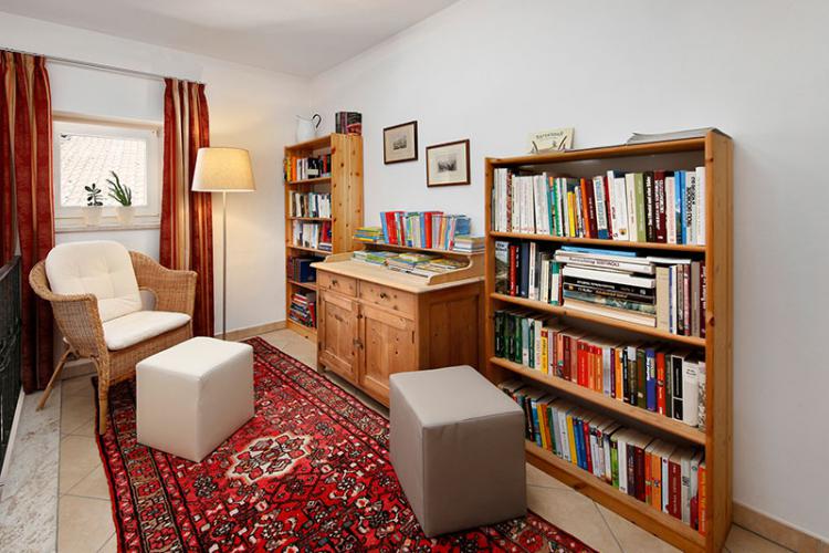 Reading corner with library for our guests